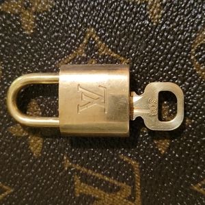 Authentic Louis Vuitton brass lock and key set #308